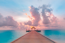 Paradise Island Beach Landscape, Sunset Sky And Sea Reflection. Vacations And Tourism Concept. Tropical Resort Hotel, Tropical Travel Background, Jetty And Water Bungalow In Maldives. Positive Vibes