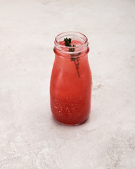 Wall Mural - lemonade, lemonade with ice in a glass bottle on a white background