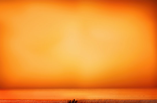 Fototapete - Orange table top on an orange background