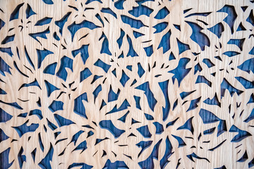 Wall Mural - carved wooden pattern on a blue treasure as interior decoration