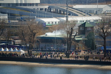 Wall Mural - People walk on the embankment