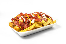 Peruvian Street Food:  Classic Salchipapas Or Sausages And French Fries  With Ketchup, Mustard, Mayonnaise And Chili Peppers Served On A White Plate