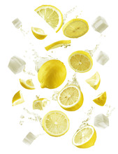 Flying Whole And Half Piece Of Lemon Fruits Splash Isolated On White Background With Explode Jelly Cube Splash.