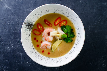 Canvas Print - thai traditional tom yam kung soup in a white bowl