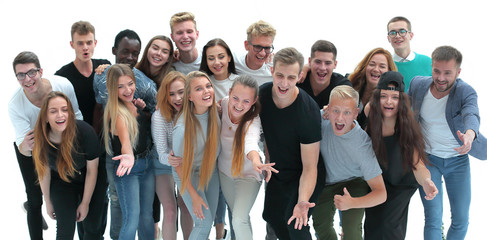 Canvas Print - group of cheerful young people looking at the camera.