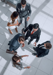 Wall Mural - top view.a group of business people standing on a marble floor.