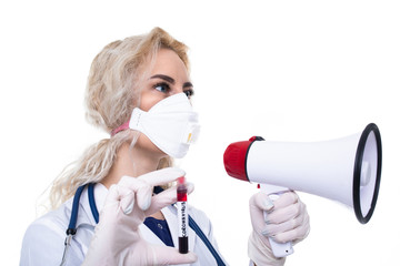 Girl doctor holds a test tube with blood in which the coronovirus was discovered and screams into the loudspeaker