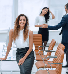 Poster - business woman on the background of business team