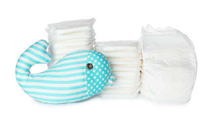 Wall Mural - disposable diapers and toy on white background