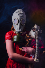 Social Distancing Young Girl Hugging Doll Wearing Gas Mask In Smoke Filled Virus Room