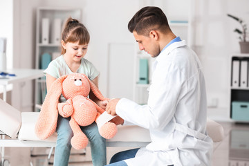 Poster - Little girl at pediatrician's office