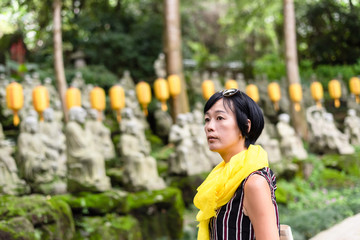 Sticker - traveling modern Asian woman at a garden