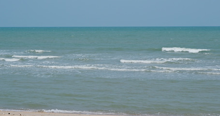 Sea wave beach and blue sky