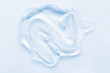© VERSUSstudio - Transparent liquid gel cream smudge on white background