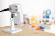 © Anna - Security camera on Wood table. CCTV , ip camera Security monitoring playing room for kids