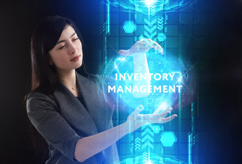 Business, Technology, Internet and network concept. Young businessman working on a virtual screen of the future and sees the inscription: Inventory management