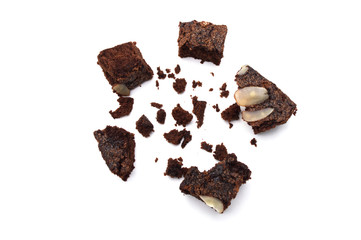 Wall Mural - Chocolate brownie with sliced almond nuts toppings crumbs isolated on white background.