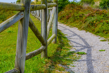 Wall Mural - Beautiful trail along the coast near the village of Liencres. Cantabria. Northern coast of Spain