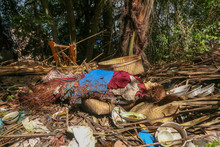 Human Remains Wrapped In Colored Cloth. Decomposing Bodies Lie On The Surface. Traditional Way Of Burial In Bali, Indonesia. Kuburan Terunyan Cemetery In Bali. Bodies Are Buried Above Ground.
