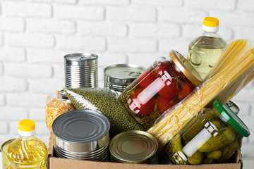 Wall Mural - Donation box with various food. Pandemic support. Close up.