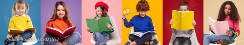 Fotografía Happy pupils reading colorful books
