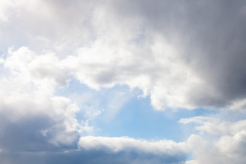 Poster - white clouds on a blue sky. background