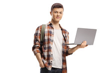Student Holding A Laptop Computer And Looking At The Camera