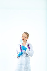 doctor nurse puts on a protective mask. A nurse in a respiratory mask. Put on masks. Wear gloves. beautiful blonde doctor shows how to put on a protective respiratory mask isolated on a white backgrou