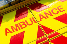 Ambulance Sign On The Side Of NHS Medical Response Vehicle.