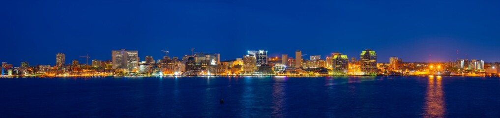 Halifax City skyline panorama at night from Dartmouth waterfront, Nova Scotia NS, Canada.