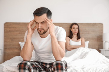 Poster - Quarreled young couple in bedroom