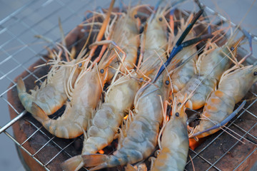 Fresh shrimp grilled bbq seafood on charcoal stove