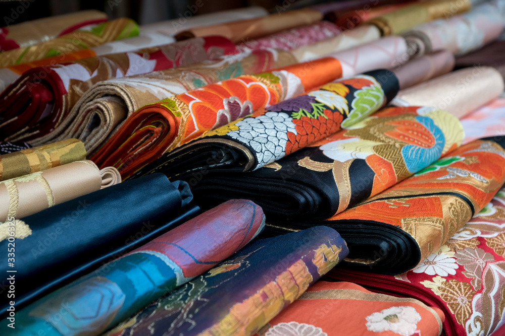 colorful japanese kimono belt obi for sale at market - obrazy, fototapety, plakaty 