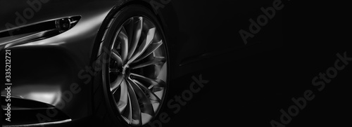 Fotomural Detail on one of the LED headlights modern car on black background,copy space