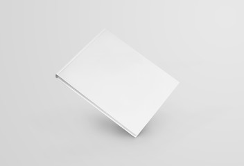 Aufkleber - Mockup of a white book standing on a corner, front view, isolated on background.
