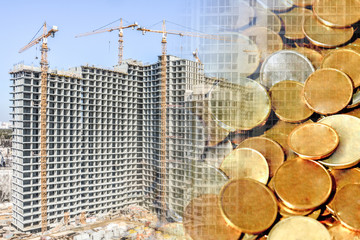 Construction of a new residential building on the background of money . The concept of the construction business .