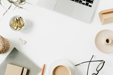 Wall Mural - Blank copy space frame of home office desk workspace with laptop on white background. Flat lay, top view girl boss work business concept.