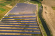 © bilanol - Aerial view of solar power plant. Electric panels for producing clean ecologic energy.