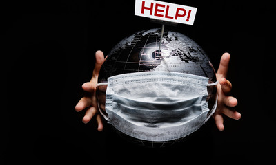 Wall Mural - hands of kid holding globe covid-19 pandemic infection disease concept