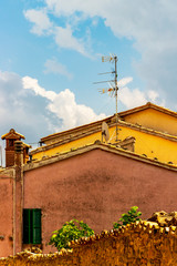 Wall Mural - Exterior high section partial view of buildings in the historical Via della Polisena or Polisena Street in Cingoli, Marche Region, Province of Macerata, Italy