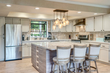 Luxury home dining room and kitchen interior with natural rustic modern deisgn.