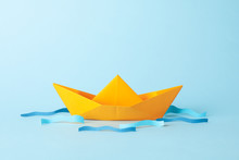 Paper Boat And Waves On Blue Background, Space For Text