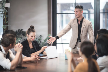 A group of business people celebrating the joy of business success