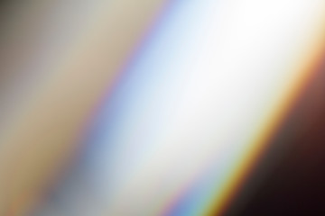 Fototapete - Lens flare and light leak haze texture on a black background.