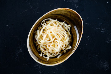 Poster - udon wheat noodle in bowl top view