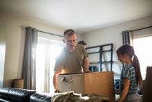Military Family Packing Belongings To Move