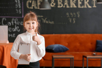 Poster - Cute little waiter in restaurant