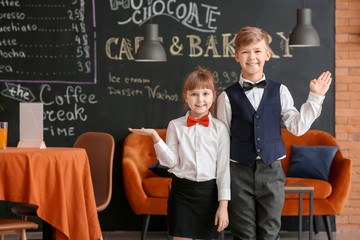 Poster - Cute little waiters in restaurant