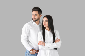 Sticker - Young couple with beautiful healthy hair on grey background