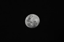 Full Moon Over Black Sky